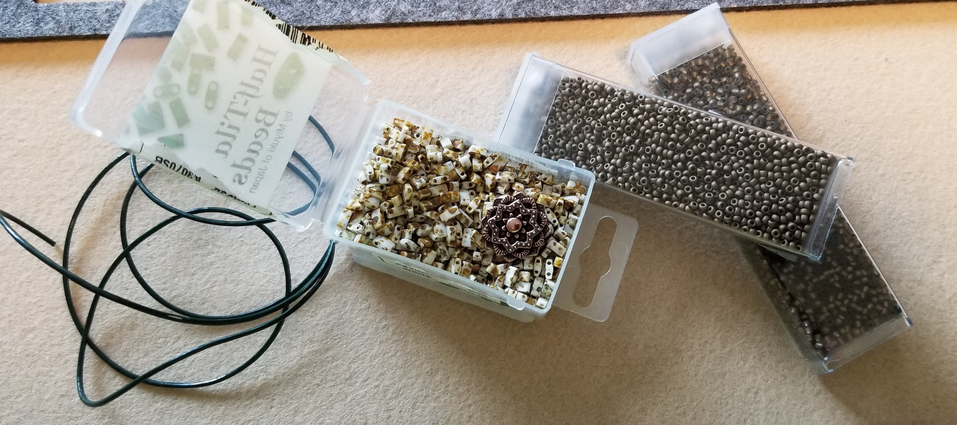 a couple of plastic containers filled with bird seed