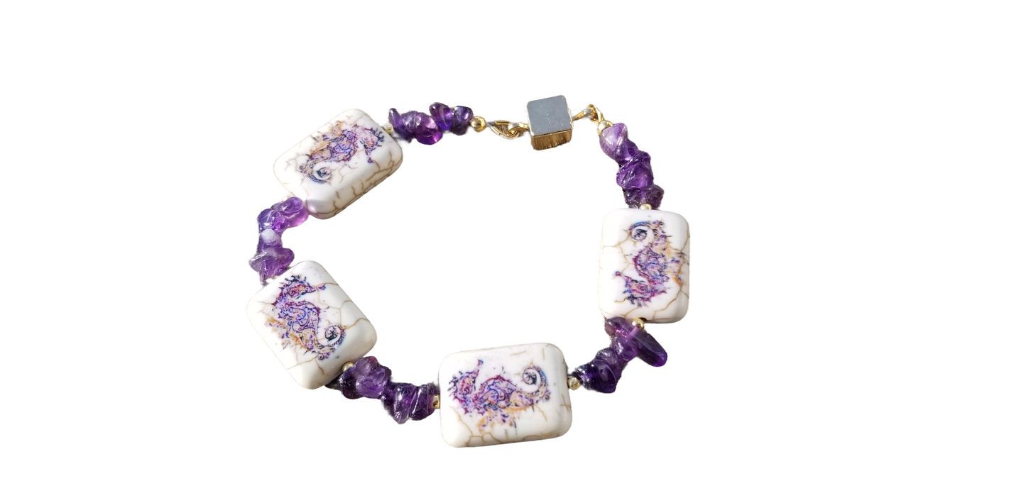 a purple and white beaded bracelet on a black background